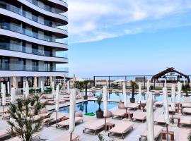 LuxuryApart Mamaia - Casa Del Mar (zona cluburi), хотел в Мамая