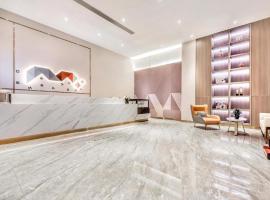 Borrman Hotel Wanning Wenming Road High-speed Railway Station, hotel in Wanning