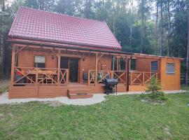 Domek na Mazurach w otulinie leśnej "Leśne zacisze", horsk&aacute; chata v destin&aacute;cii Wydminy