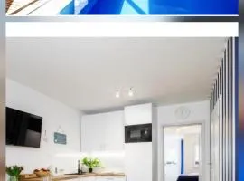 Apartament 2B Niebieskie Apartamenty Poddąbie z basenem krytym, odkrytym, salą zabaw, animacjami