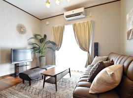ゲストハウスえらぶー, hotel in Wadomari