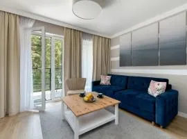 Nadmorski Apartament w Pobierowie z Parkingiem oraz Basenem by Noclegi Renters