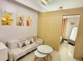 Cozy 1BR Condo at Grass Residences near SM North