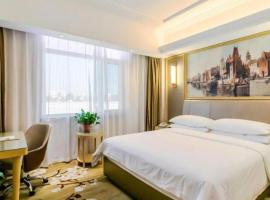 Vienna Hotel Shandong Qingdao Jiaodong International Airport Hai'er Avenue、Madianのホテル