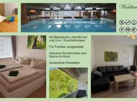 Waldtraum Schwimmbad Sauna Kinderbett wandern