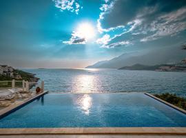 Villa Alis stunning sea view with Infinity Pool, hotel in Kas