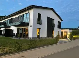 Vinkennest am Diemelsee - Sonnenweg 44 - Kinderfreundliche Ferienwohnung mit Sauna, Terrasse, Garten und Seeblick! Bitte den gewünschten Zeitraum trotz fehlender Preise im Kalender auswählen!