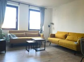 Industiral Design - 24h Self-Check- in - bis 7 Personen - zentrale Lage - Parkplatz - WiFi - Monteure