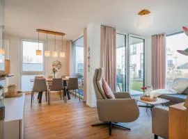 Hygge – Familienfreundliche Ferienwohnung mit Garten & Meerblick