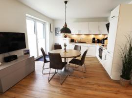 KÜSTE33/10 – Exklusive Ferienwohnung mit Sauna & nah am Strand!, hotel v destinaci Tossens