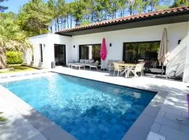 VILLA LUCIA, moderne avec piscine tempérée, ping pong, proche plage à Vieux-Boucau