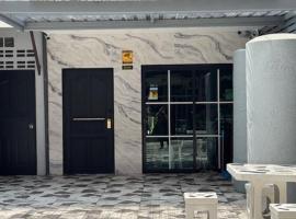 Tin Guest House & Laundry，位于乔木提恩海滩的旅馆