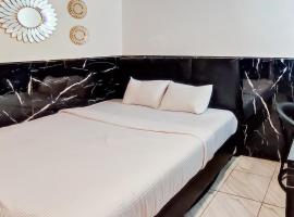 Urbanview Hotel Dream Guesthouse Padang, hotel v destinaci Kampungdurian