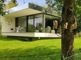 Logement insolite miroir dans la nature avec bain nordique
