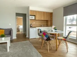 Апартамент с люлка и гледка в The House с Термална зона