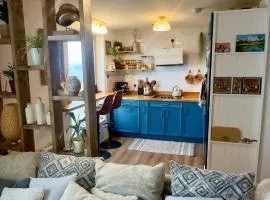 Ocean view flat with cozy vibes