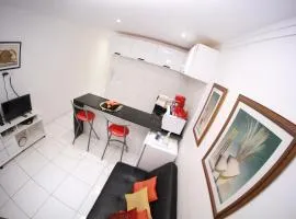 Flat Aconchego BEIRA-MAR térreo quase pé na areia