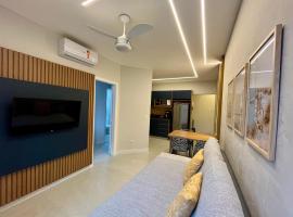Lindo Flat em Riviera - Próximo da praia e NOVINHO, hotel em Riviera de São Lourenço