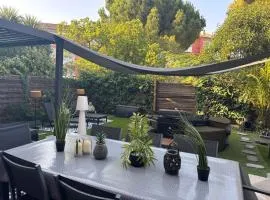 Havre de paix avec jardin et terrasse