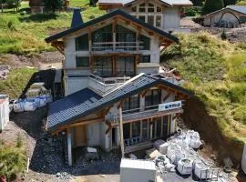 Chalet APY - Grand chalet neuf avec terrasse, 6 chambres, wifi, balcon, bornes électriques etc