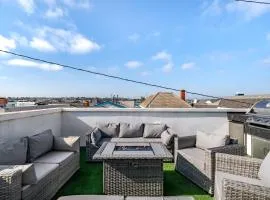 Private Rooftop Steps to the Beach Chic Design Seaside Style by AvantStay