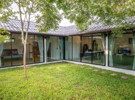 Aqua Suites, hotel i Wok Tum