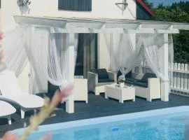 Domek wakacyjny z podgrzewanym basenem i jacuzzi pod gwiazdami, Studnica, Ińsko, "THerapeutica"