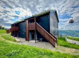 Ski-In Out apt Hafjell - Sauna and Stunning Views, hotel i Hafjell