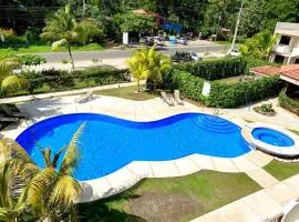 Cozy Condo with Panoramic Hillside Views from Rooftop Terrace and Short Walk to Beach