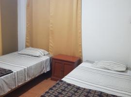 Habitación con doble cama privada en Talara centro, hotel a Talara