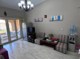شالية في قرية الزهور, Hotel in El-Alamein