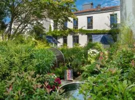 Escale Rochelaise, chambre avec access spa et sauna