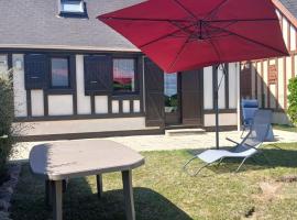 Chalet 5 personnes proche de la mer à Merville-Franceville-Plage, hotel in Merville-Franceville-Plage