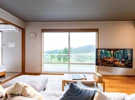 貸切温泉宿 Shiny inn Kirishimaシャイニーイン霧島, hotel na may mga hot tub sa Kirishima