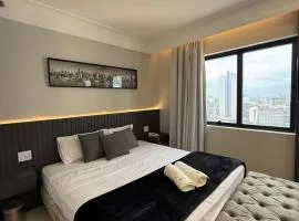 Flat Moderno Hotel Slaviero GRU até 4p | Delfhy
