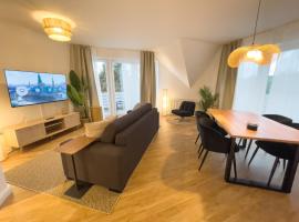 Sonnige Ferienwohnung mit Balkon und gute Lage, Hotel in Grömitz