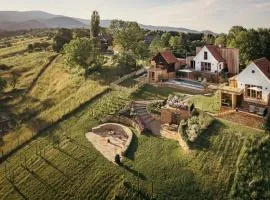 Am Wildbachberg - Luxus Ferienhäuser mit Infinitypool, Privatsauna und Weinkeller