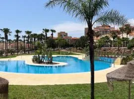 Almerimar Amplio Apartamento de 3 Habitaciones con Piscina, pista de padel, futbol y Garaje Cubierto para 2 Coches en Altas Entinas
