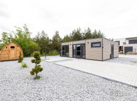 NORA Stays Tiny House direkt am See - Sauna - Klima, tiny house in Buschm&uuml;hle