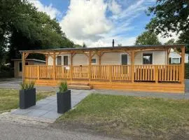 Luxe chalet op 5-sterren camping-4P-ruime veranda-2 fietsen