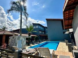 POUSADA OHANA, SUITES ao LADO DO SESC BERTIOGA, e PROXIMO A PRAIA, serviced apartment in Bertioga