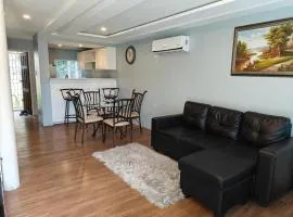 The Cozy Flat by UWI