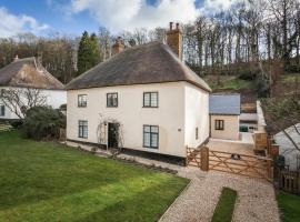 Three Little Pigs Luxury Cottage, хотел в Milton Abbas