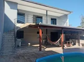 Sobrado com piscina em Caioba
