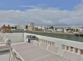 Maison vue sur le chenal avec toit terrasse