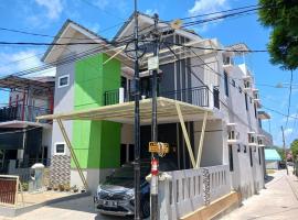 Super OYO 93085 Homy Stay Syariah, hotel in Sepinggang-besar