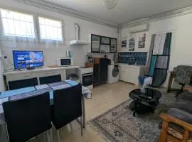 Appartement avec jardin centre village avec accès PMR