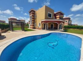 Villa Rosana Northcoast, ξενοδοχείο σε Dawwār al Ḩajj Aḩmad