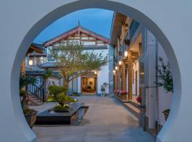 Floral Qinyuan Light Luxury Inn Lijiang Ancient Town Flagship Store, hotell sihtkohas Lijiang lennujaama Lijiang Sanyi Airport - LJG lähedal