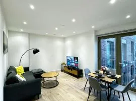 Stylish 2BR Apartment with Balcony & Views